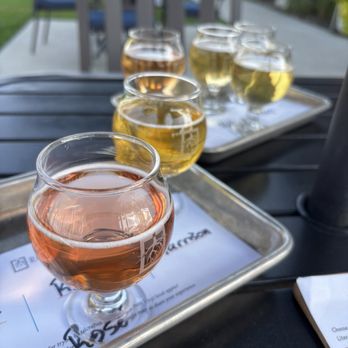 Rootwood Cider at the Orchard - Flight - Cideries Near Me - Manson, Washington Rootwood Cider at the Orchard - Flight - Cideries Near Me - Manson, Washington