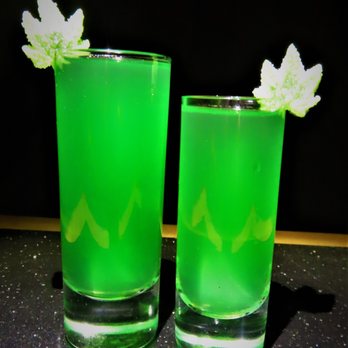 The Roaming Bar - two glasses of green liquid - Bartenders Near Me The Roaming Bar - two glasses of green liquid - Bartenders Near Me