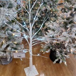 Bed Bath & Beyond - Who buys these $40 Charlie Brown white stick trees. And it's not Halloween yet people!