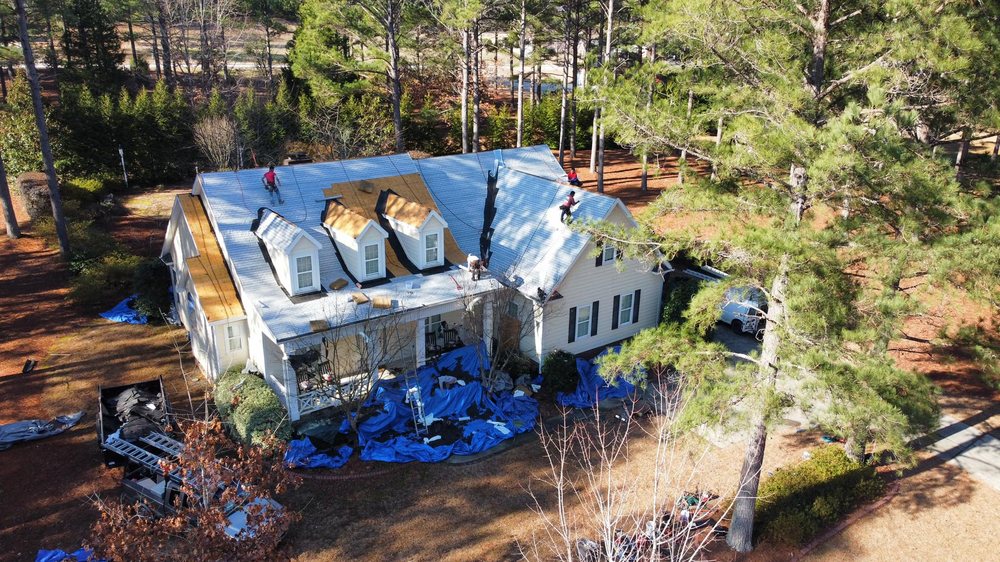 Slide of Lakelands Roofing