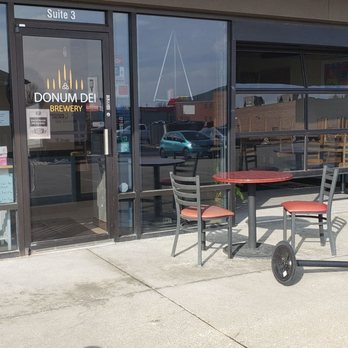 Donum Dei Brewery - They added a few tables outside to help with social distancing and to enjoy the sun while imbibing! - Breweries Near Me - New Albany, Indiana Donum Dei Brewery - They added a few tables outside to help with social distancing and to enjoy the sun while imbibing! - Breweries Near Me - New Albany, Indiana