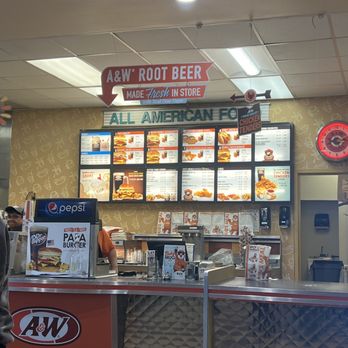 A&W Restaurant - a man standing in front of the counter - Fast Food Near Me - Baker, California A&W Restaurant - a man standing in front of the counter - Fast Food Near Me - Baker, California