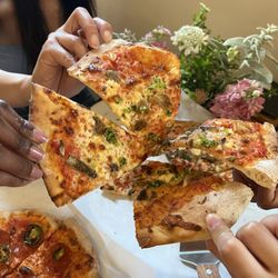 Marco's Cafe - Cheersing our slices
