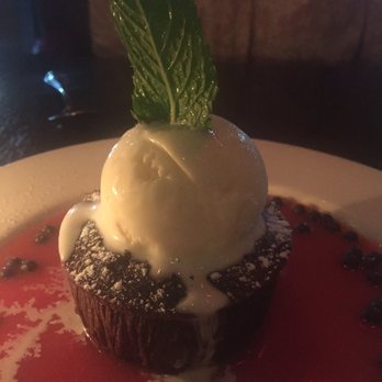 CIRCA at Clarendon - Chocolate decadence cake|chocolate pearls, raspberry coulis, toasted strawberry gelato - New American Near Me - Arlington, Virginia