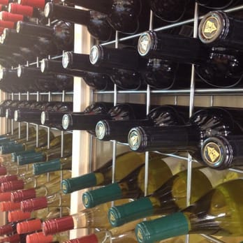 Peju Winery - Wine Rack in the Reserve tasting room. - Wine Tasting Room Near Me - Rutherford, California Peju Winery - Wine Rack in the Reserve tasting room. - Wine Tasting Room Near Me - Rutherford, California