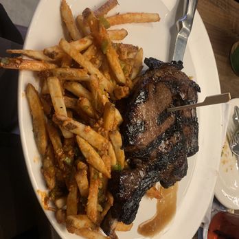 Yard House - 20 oz. Bone-In Rib Eye - New American Near Me - New York, New York Yard House - 20 oz. Bone-In Rib Eye - New American Near Me - New York, New York