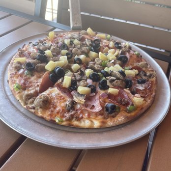 Pizza Place - 10" pizza with Canadian bacon, black olives, extra tomato & artichoke. - Pizza Near Me - Tropic, Utah Pizza Place - 10" pizza with Canadian bacon, black olives, extra tomato & artichoke. - Pizza Near Me - Tropic, Utah