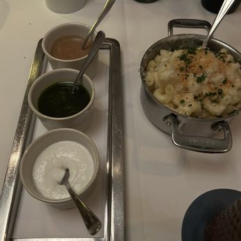 Bourbon Steak - Sauce Trio- (Top to Bottom)- Au poivre, chimichurri and horseradish. Mac n cheese on the right. - Steakhouses Near Me - Glendale, California Bourbon Steak - Sauce Trio- (Top to Bottom)- Au poivre, chimichurri and horseradish. Mac n cheese on the right. - Steakhouses Near Me - Glendale, California