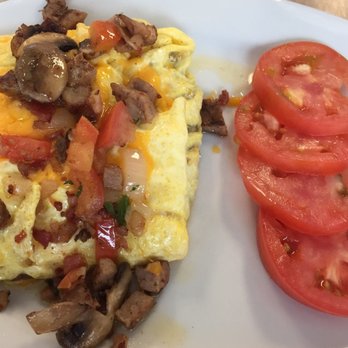 JJ's Cafe - Build an omelette with 5 items. Didn't want bread so they gave me tomatoes. - Breakfast & Brunch Near Me - Rockport, Texas
