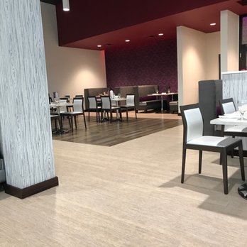 Camas - a dining area with tables and chairs - New American Near Me - Omak, Washington Camas - a dining area with tables and chairs - New American Near Me - Omak, Washington