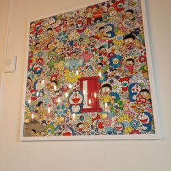 Chicha San Chen - Cute Doraemon picture on their wall.