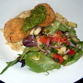 Bizou - crab cakes on potato gratin with a salad and pesto. - Breakfast & Brunch Near Me - Charlottesville, Virginia Bizou - crab cakes on potato gratin with a salad and pesto. - Breakfast & Brunch Near Me - Charlottesville, Virginia
