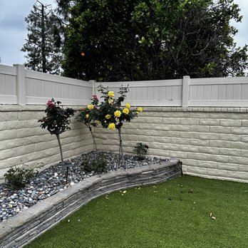 Jose's Landscaping - Finished artificial turf, primed & painted wall, Mexican beach rock fill and vinyl fence wall topper - Landscaping Near Me - Oxnard, California