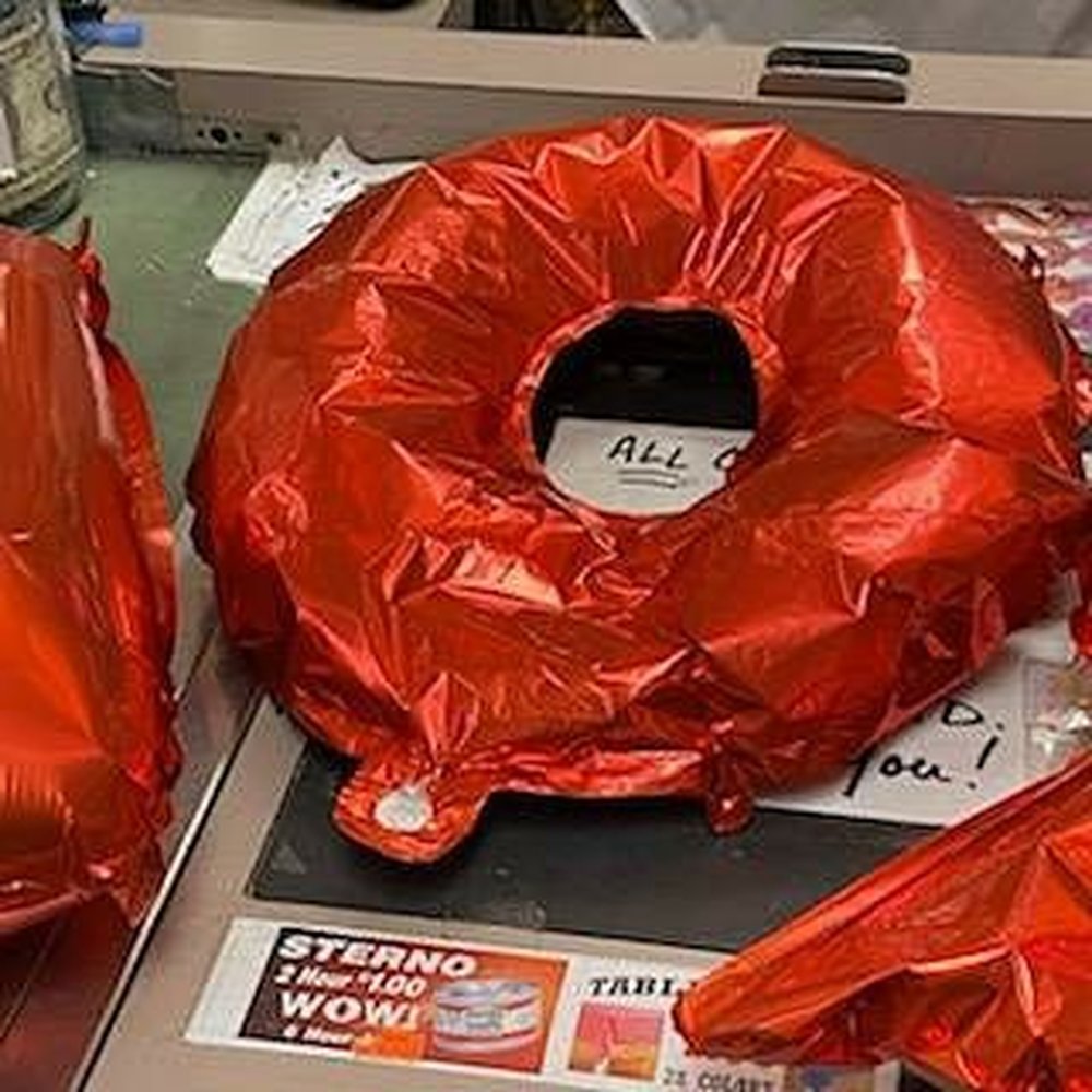 Balloon Tycoon and Party World - Deflated balloon laid on counter before leaving store - Party Supplies Near Me - Glenolden, Pennsylvania Balloon Tycoon and Party World - Deflated balloon laid on counter before leaving store - Party Supplies Near Me - Glenolden, Pennsylvania