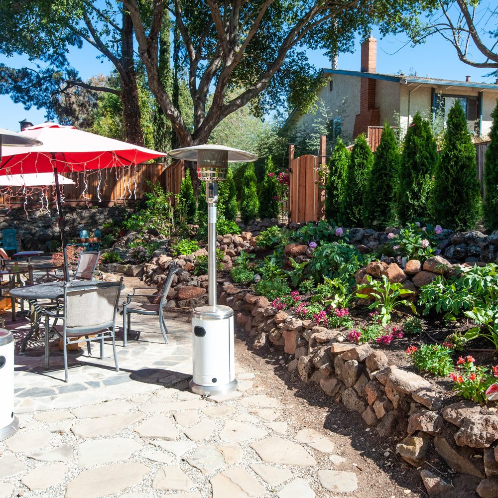 Core Landscaping - the main part of our backyard with the Arborvitae hedge and the flower garden - Hydrangeas, Azaleas, Peonies, Calla Lilies, Peruvian Lilies - Landscaping Near Me Core Landscaping - the main part of our backyard with the Arborvitae hedge and the flower garden - Hydrangeas, Azaleas, Peonies, Calla Lilies, Peruvian Lilies - Landscaping Near Me