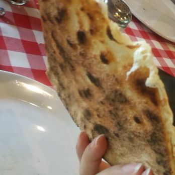 Grimaldi's Pizzeria - Lightly charred crust bottom - Pizza Near Me - Houston, Texas Grimaldi's Pizzeria - Lightly charred crust bottom - Pizza Near Me - Houston, Texas
