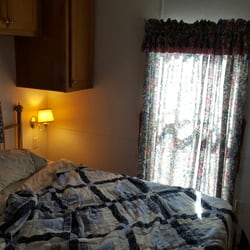 Nemo Bridge Resort - Full bedroom with tv...ignore the bed mess....my fault.