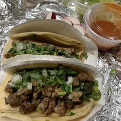 Tacos Mexicano Mary - Tacos - steak in the front, chicken in the back.