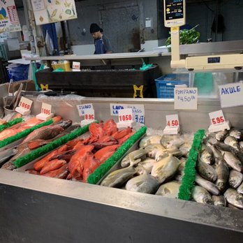 Troy Enterprise - This fish market has open displays and expect the floors to be wet from melting ice - Seafood Markets Near Me - Honolulu, Hawaii