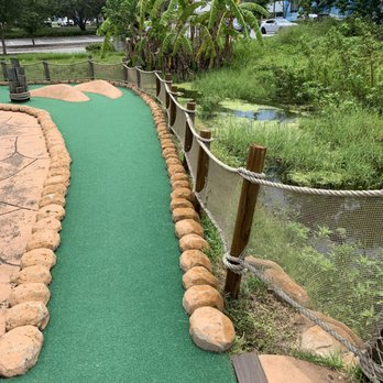 Lost Caverns Adventure Golf - Ponds over grown with weeds, algae, and.......trash - Mini Golf Near Me - Orlando, Florida