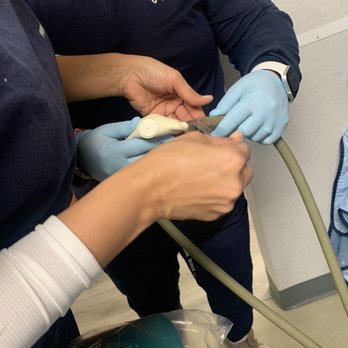 Prime Dental Partners - Sheepshead bay - Staff duct taping dental equipment - Cosmetic Dentists Near Me - Brooklyn, New York Prime Dental Partners - Sheepshead bay - Staff duct taping dental equipment - Cosmetic Dentists Near Me - Brooklyn, New York