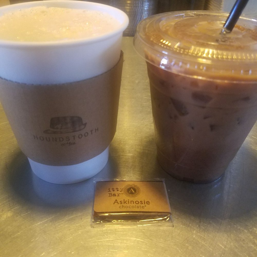Houndstooth Coffee - Chai tea latte on left and iced chocolate latte on right. We also ordered a small chocolate piece. - Coffee & Tea Near Me - Dallas, Texas Houndstooth Coffee - Chai tea latte on left and iced chocolate latte on right. We also ordered a small chocolate piece. - Coffee & Tea Near Me - Dallas, Texas