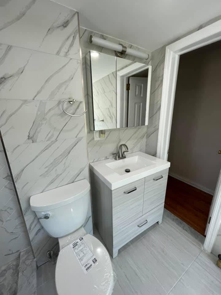 Slide of The in and out plumbing guy