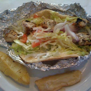 Greek Village - Chicken souvlaki on scrumptious pita bread for lunch w/Greek potatoes - $7.95 before taxes on 5/2009 - Greek Near Me - Silver Spring, Maryland Greek Village - Chicken souvlaki on scrumptious pita bread for lunch w/Greek potatoes - $7.95 before taxes on 5/2009 - Greek Near Me - Silver Spring, Maryland