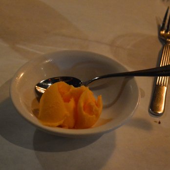 Fiamma Ristorante - Orange Sorbet to cleanse the pallet - Italian Near Me - Charlotte, North Carolina Fiamma Ristorante - Orange Sorbet to cleanse the pallet - Italian Near Me - Charlotte, North Carolina