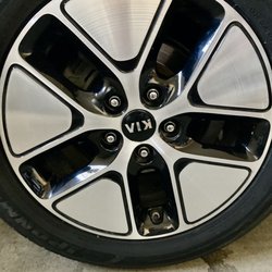 J J Tire - Newly mounted tire and wheel.