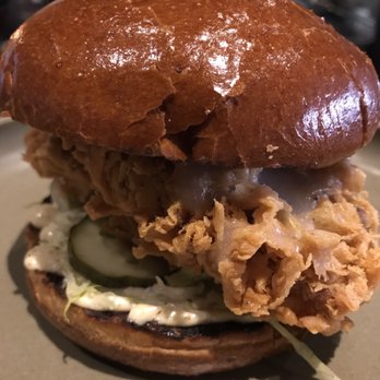 Roister - Fried chicken sandwich with a sunchoke hotsauce and chamomile mayo - New American Near Me - Chicago, Illinois Roister - Fried chicken sandwich with a sunchoke hotsauce and chamomile mayo - New American Near Me - Chicago, Illinois