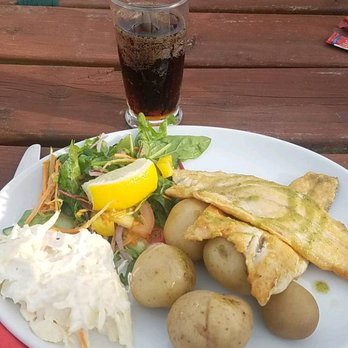 Murphy's Pub at The Islander's Rest - (Sorry for the bad pic!) The sea bass was amazing and the salad & potatoes were good. I don't eat coleslaw but everyone else liked it. - Pubs Near Me - Sherkin Island, Colorado