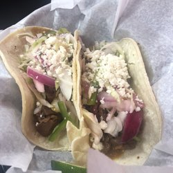 The Iron Daisy - Jack fruit tacos with orange mole sauce.