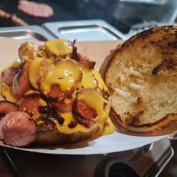 Mexidogs - Burger with chopped up TJ hot dog (bacon wrapped) and nacho cheese. I don't like veggies, that's why it doesn't have any but it's good