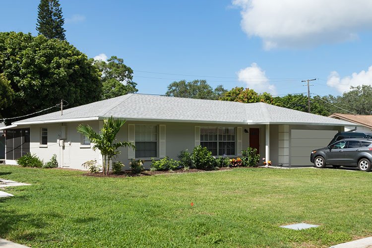 Slide of AKVM Roofing