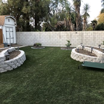JJ Concrete & Landscaping - After: Juan's hard work and design of the planters we wanted - Landscaping Near Me