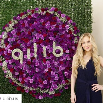 Larkspur Botanicals - Branded floral wall - floral step and repeat from product launch. - Florists Near Me - Dumont, New Jersey