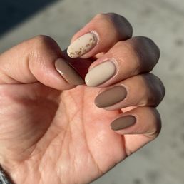 Gel manicure, with some gold