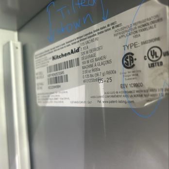 Appliances Services and Wholesale - Uneven tilting downward on right side. Sticker is dirty and obviously replaced - Appliances & Repair Near Me - Orange, California