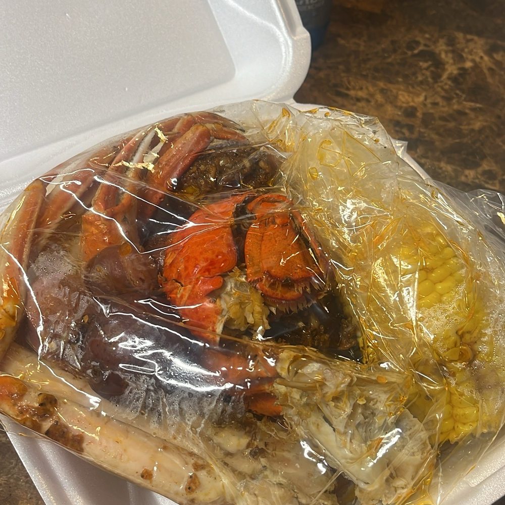 The Crab Barrack - Snow crab bag with potato, corn , sausage and lobster tail - Seafood Near Me - Midfield, Alabama The Crab Barrack - Snow crab bag with potato, corn , sausage and lobster tail - Seafood Near Me - Midfield, Alabama