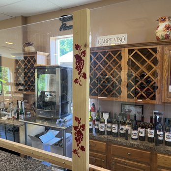 Brooks Hill Winery - a woman looking at wine bottles - Wineries Near Me - Brooks, Kentucky
