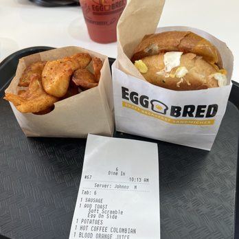Eggbred - Sausage, egg and cheese sandwich with beer battered potatoes - Breakfast & Brunch Near Me - Chino Hills, California Eggbred - Sausage, egg and cheese sandwich with beer battered potatoes - Breakfast & Brunch Near Me - Chino Hills, California