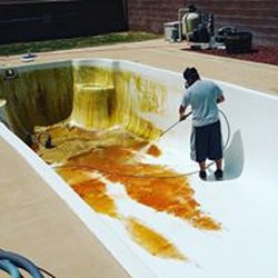 Wrapping up an acid wash on a fiberglass pool!