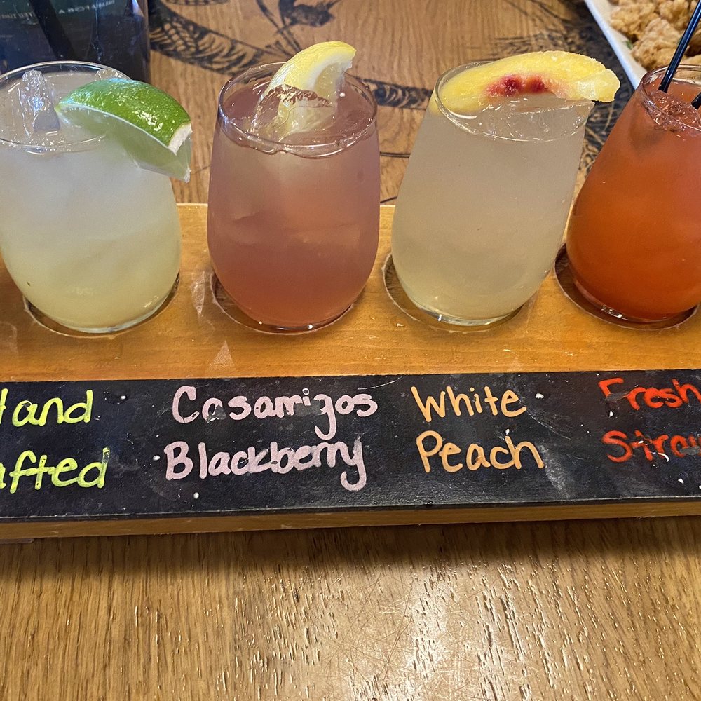 BJ's Restaurant & Brewhouse - Margaritas flight and Crispy Calamari in the back - New American Near Me - Orlando, Florida BJ's Restaurant & Brewhouse - Margaritas flight and Crispy Calamari in the back - New American Near Me - Orlando, Florida