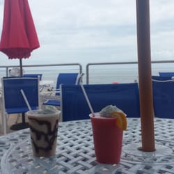 Sandbar Cafe & Lounge - Frozen drinks over looking the sea Having a charmed moment
