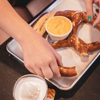 Bullet Bar and Grill - The .50 Cal German Pretzel is the perfect appetizer to share (but you won't want to) - American Near Me - Post Falls, Idaho Bullet Bar and Grill - The .50 Cal German Pretzel is the perfect appetizer to share (but you won't want to) - American Near Me - Post Falls, Idaho