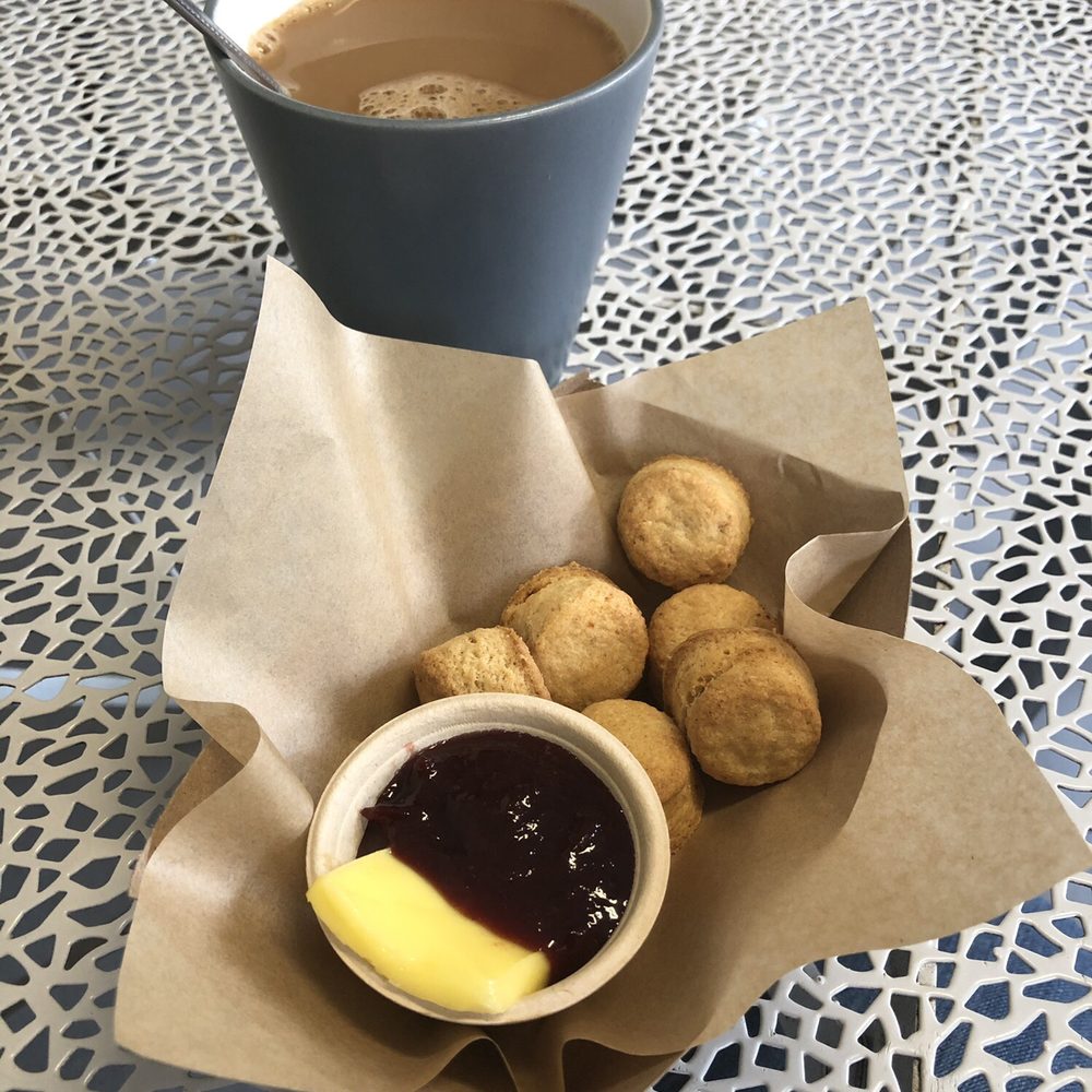 Standard Fare - Mini biscuits (more like shortbread) with butter and homemade plum jam. - Coffee & Tea Near Me - Berkeley, California
