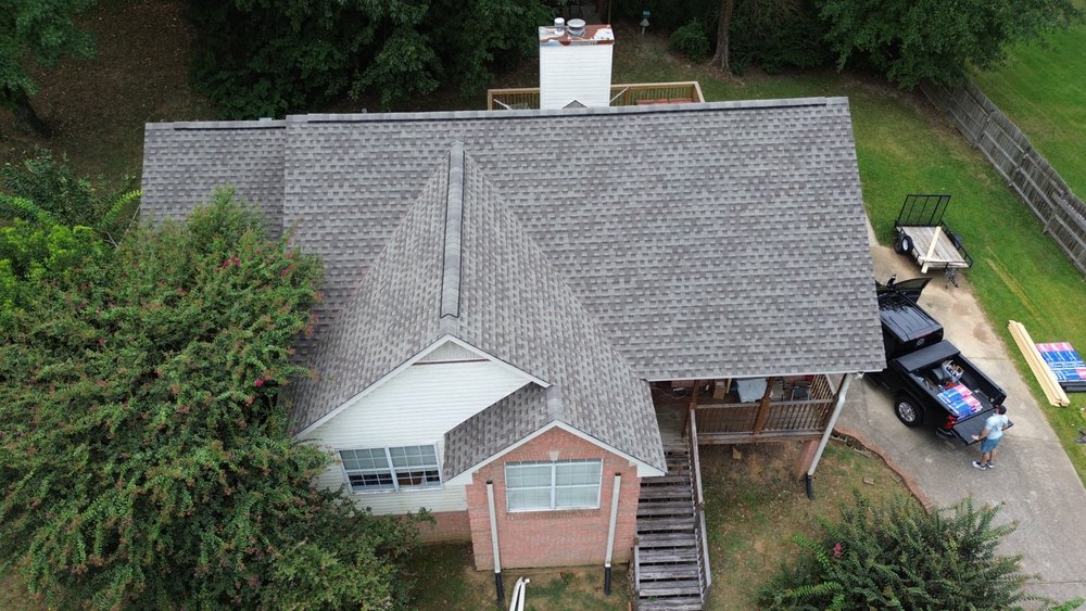 Slide of Top of the Line Roofing