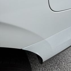 Ascue's Auto Body & Paint Shop - I was charged extra for this "special ordered pearlescent white paint" to match my car... and it doesn't match.