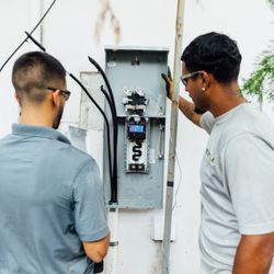 Battle Electric - The Battle Electric team working on a residential electrical service upgrade.